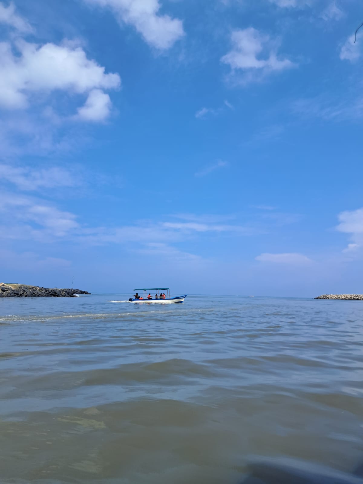 A boat on the Ariyankuppam river where it meets the Bay of Bengal, near Arikamedu