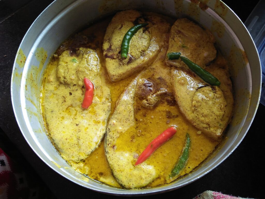 Bhapa ilish, steamed hilsa with mustard, prepared in a home kitchen in Howrah